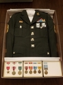Military uniform in safe storage box and preserved